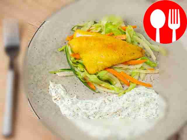 Sea bass in turmeric with fresh salad and tzatziki sauce
