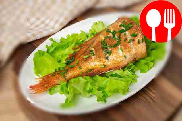 Sea bass baked in garlic-ginger marinade