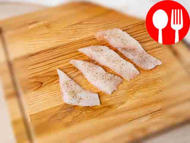 Cut the sea bass carcass into pieces. Sprinkle...