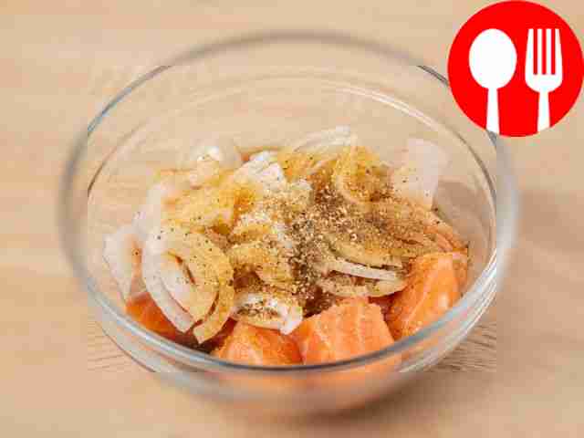 Pour soy sauce and vegetable oil into a deep...