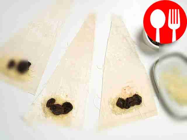 Start shaping the croissants. Fold the phyllo...