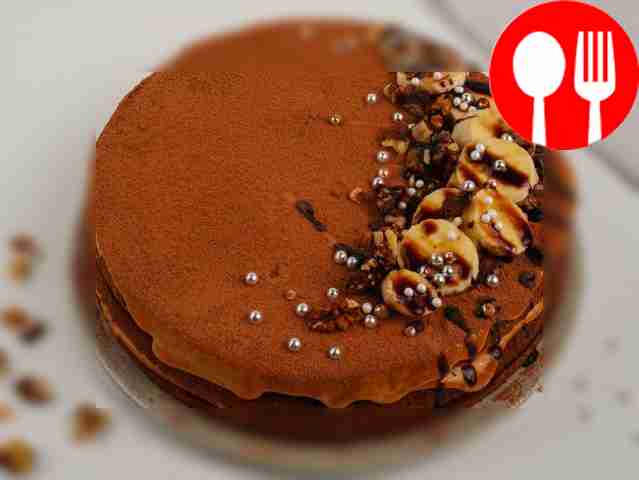 Cake made from ready-made shortcakes with boiled condensed milk and banana