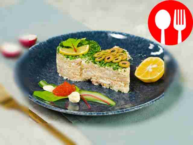 Салат из рыбных консервов с яйцом и рисом