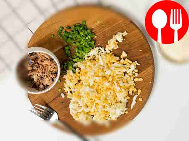 Prepare your ingredients. Grate the boiled...