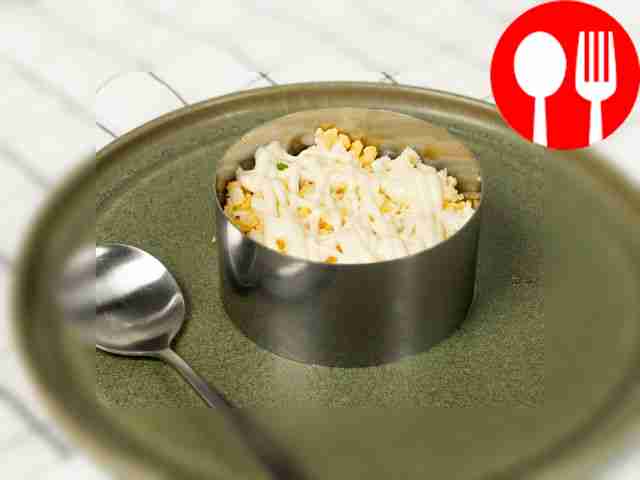 Form a salad. Take the cooking ring and place...