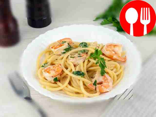 Before serving, garnish a serving of pasta...