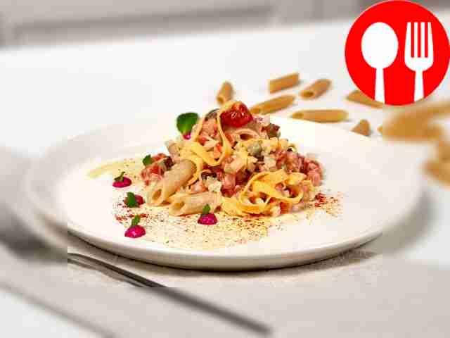 Fish salad with pasta and egg pancakes