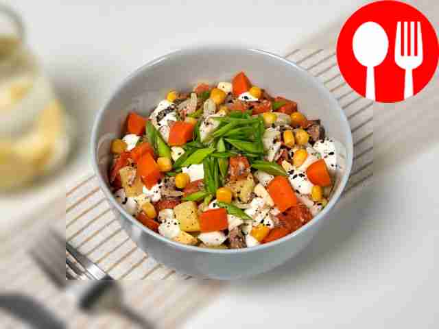 Salad with canned fish, onions and potatoes