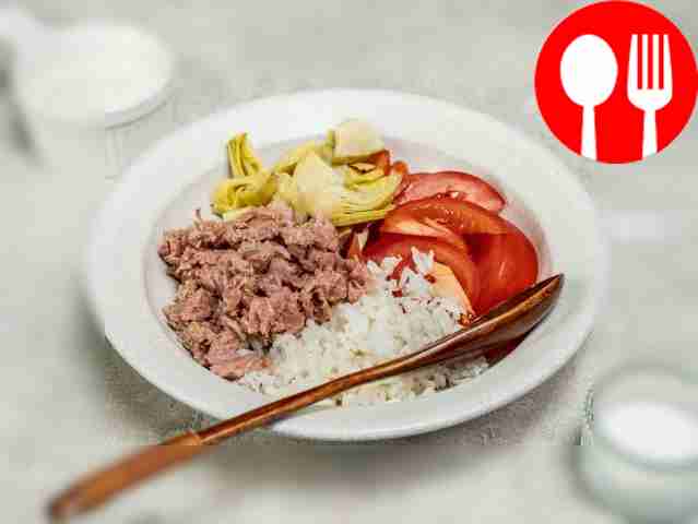 Prepare the salad. Place rice in a salad bowl,...