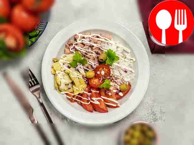 Serve the salad chilled, garnished with cherry...