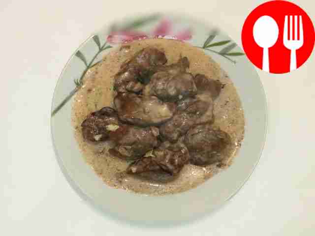 Homemade chicken liver in sour cream and cheese sauce