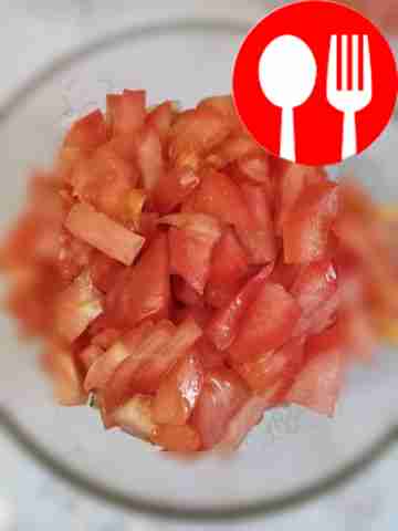 Slice the tomatoes there too.