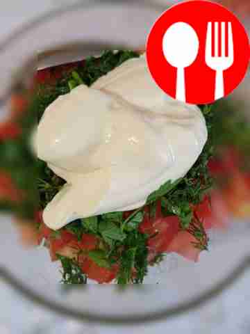 Add mayonnaise to the chopped ingredients and stir.