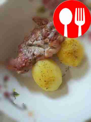 Baked chicken thigh fillet with boiled potatoes