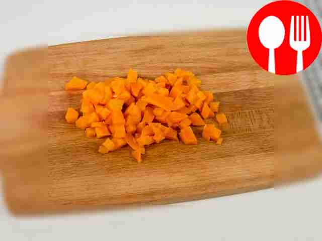 Peel the boiled vegetables and cut them into...