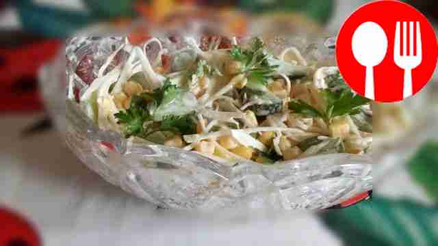 Light cabbage salad with cucumbers and sweet corn