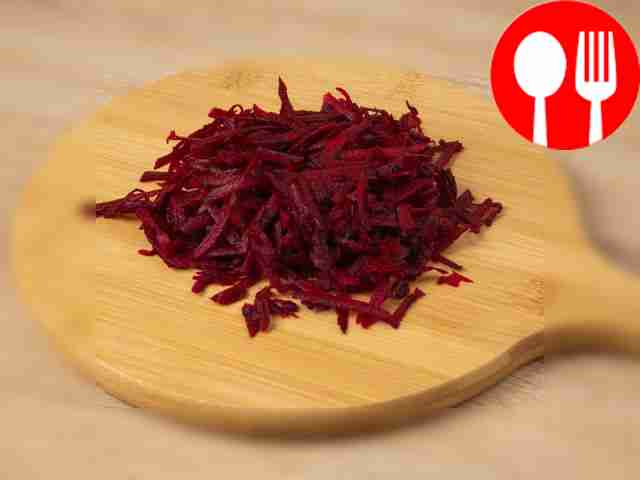 Finely chop the prunes and walnuts. Grate the...