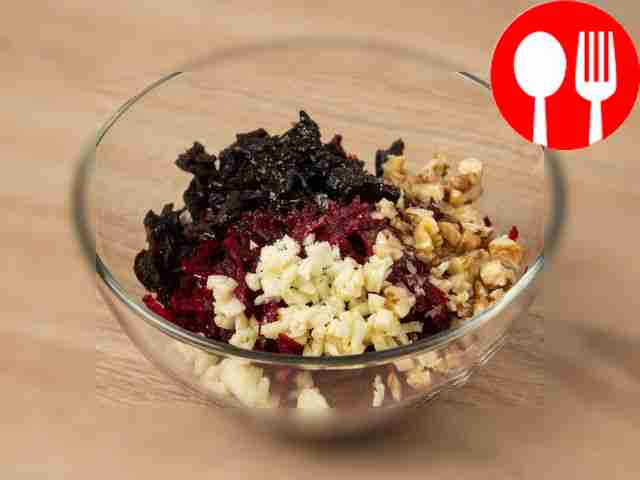 Place beets, pressed garlic, walnuts and...