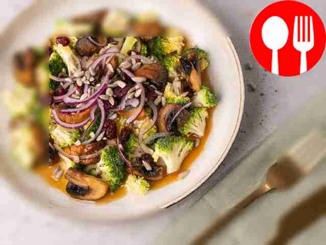 Raw broccoli and baked mushroom salad
