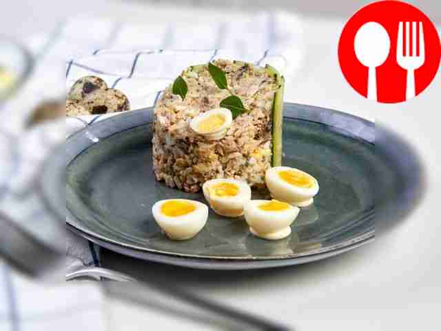 Fish salad with cheese and rice