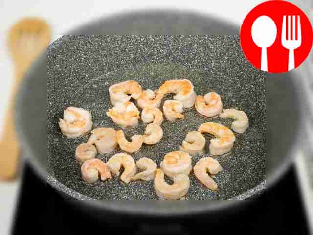 Peel the shrimp and fry in a hot pan for a...