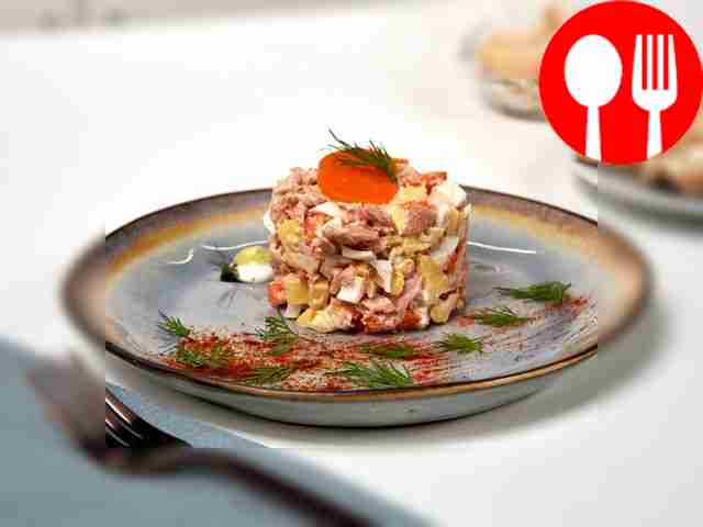 Salad of canned fish, eggs and potatoes