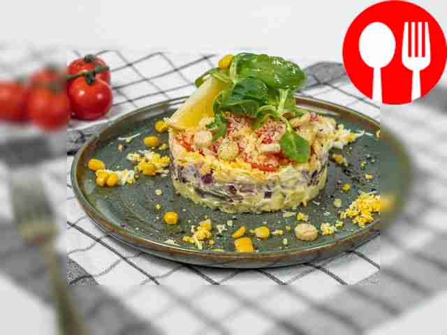 Salad of sprats, eggs and onions