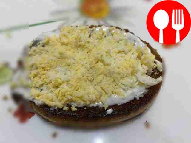 Grate the eggs on a fine grater, sprinkle each...