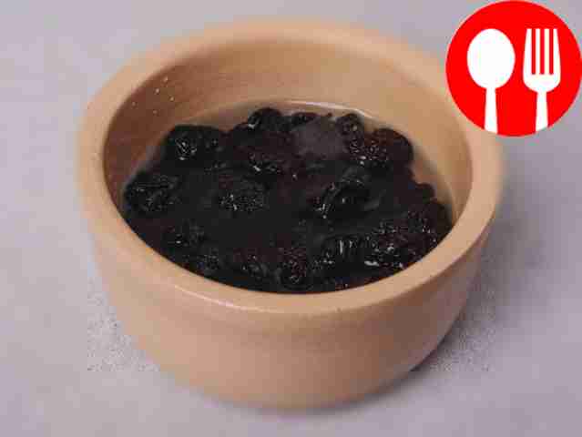 Wash the raisins under running water and soak...