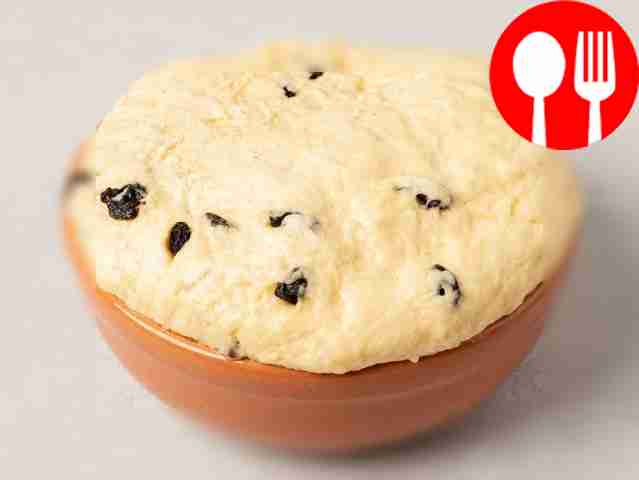 Knead the yeast dough. Add raisins and nuts as...