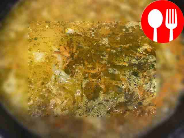 Add spices to the rice and vegetables, stir...