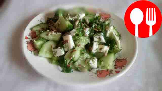 Fresh vegetable salad with mozzarella and sesame seeds