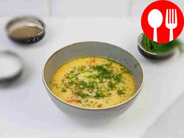 Egg soup with herbs and tomatoes