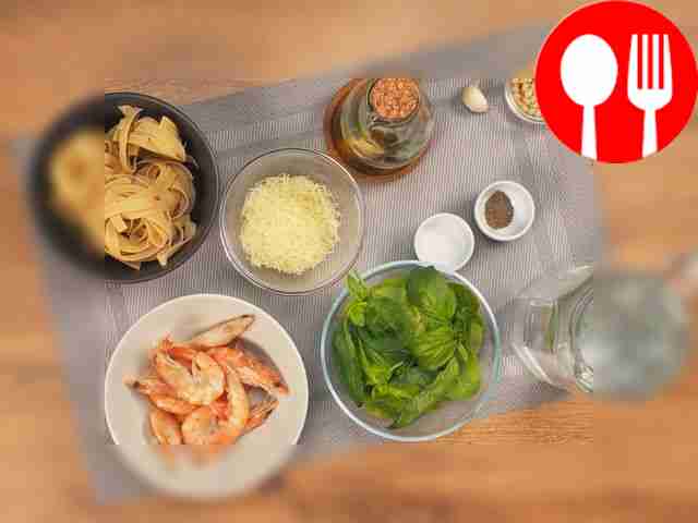 Wash the basil leaves and dry them with a dry...