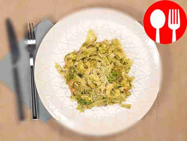 Serve the dish in portions. Sprinkle the pesto...