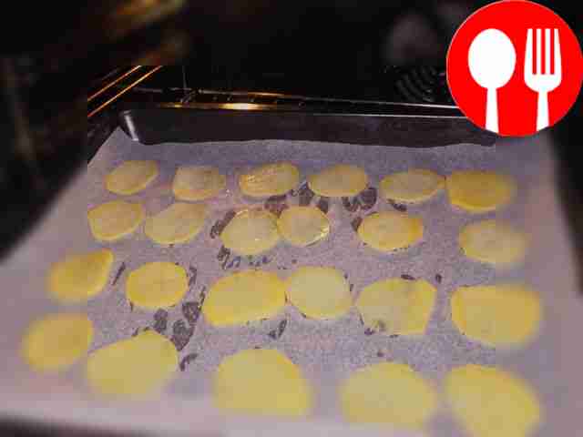 Make chips. Prepare a baking tray, cover it...