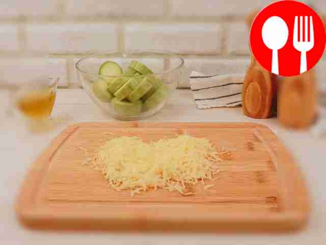 Grate the cheese on a fine grater.