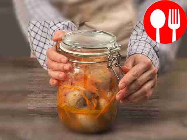 Place marinated champignons with carrots in a...