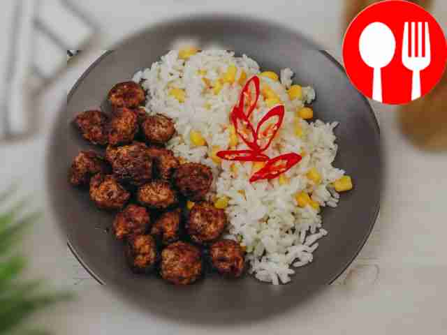 Rice with meatballs and corn