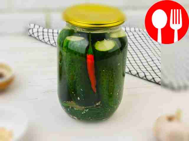 Place the cucumbers tightly in the jar so that...