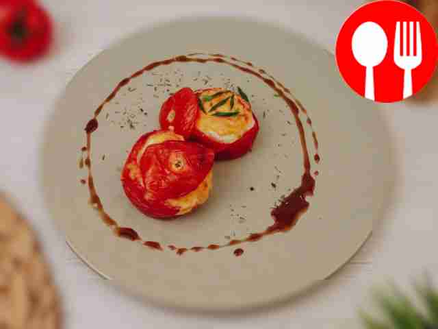 Tomatoes stuffed with sausage, egg and cheese