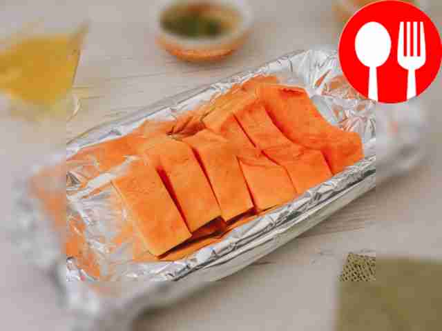 Line a baking dish with foil. Place pumpkin...
