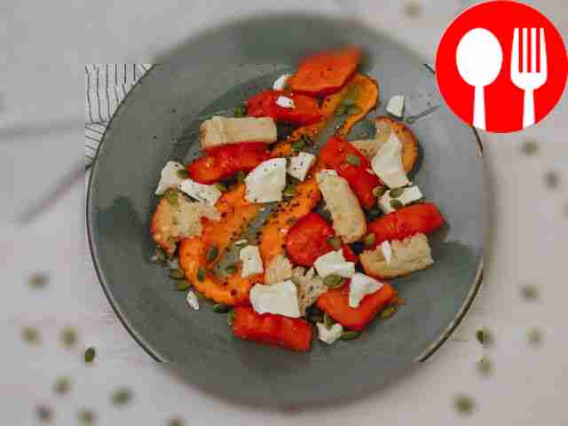 Baked pumpkin with cheese and baguette