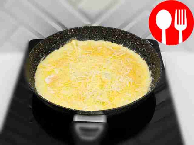 Melt a piece of butter in a heated frying pan,...