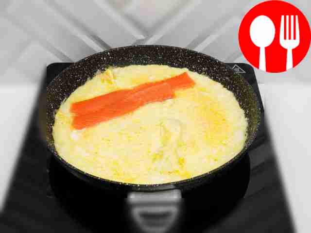 Slice the red fish and place it towards one of...