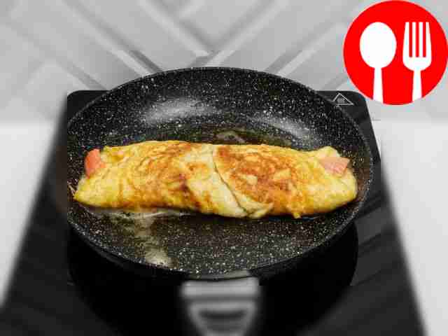 Carefully roll the omelette into a roll.