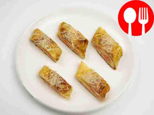 Cut the omelette into equal pieces and serve!