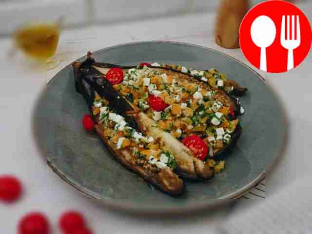 Baked eggplant with feta cheese and arugula