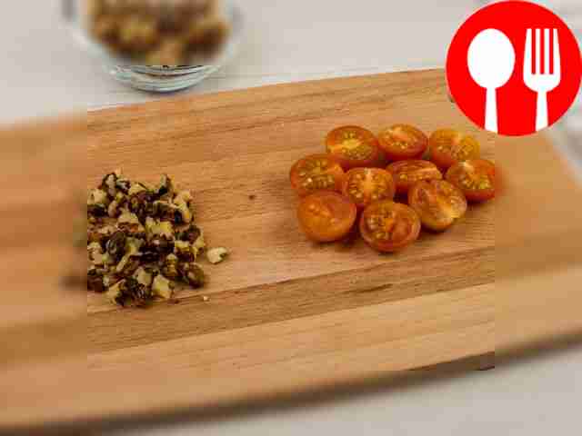 Cut the cherry tomatoes into halves, chop the...