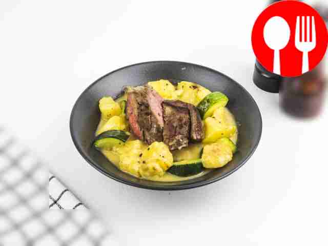 Beef baked with potatoes and zucchini